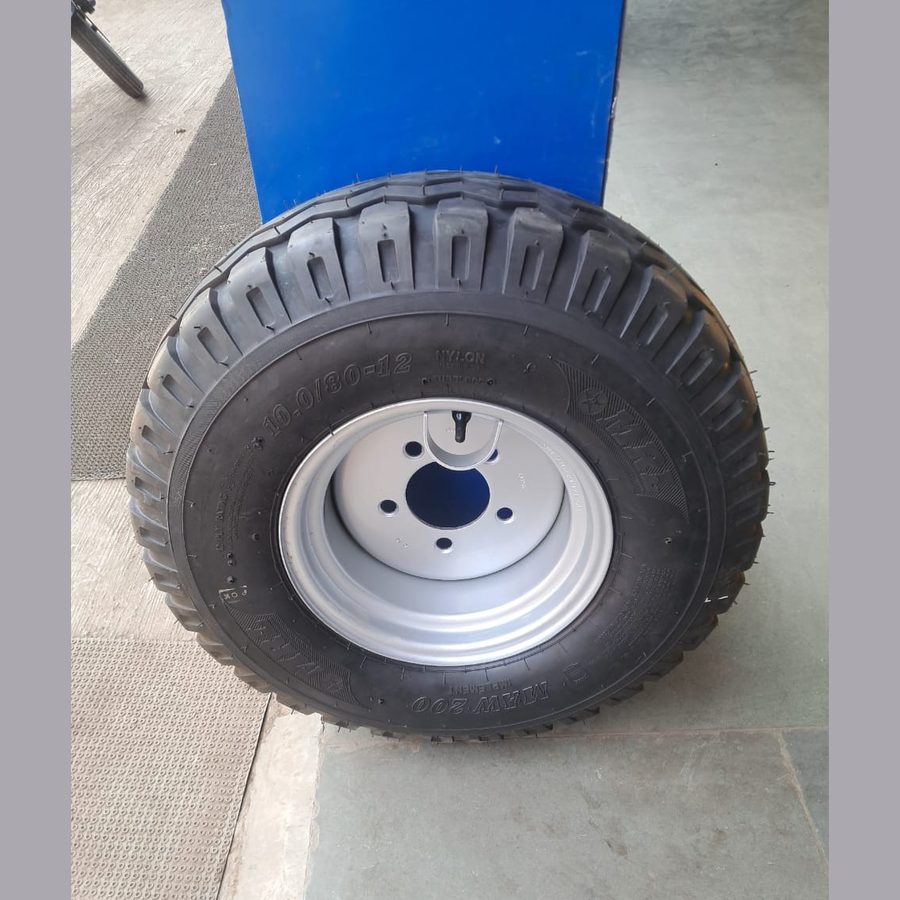 10.0/80-12 implement tyre fitted on a silver 5-bolt wheel rim
