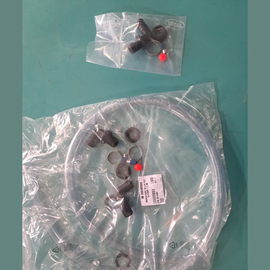 Water level indicator kit with clear tube, fittings and hose clamps in a bag
